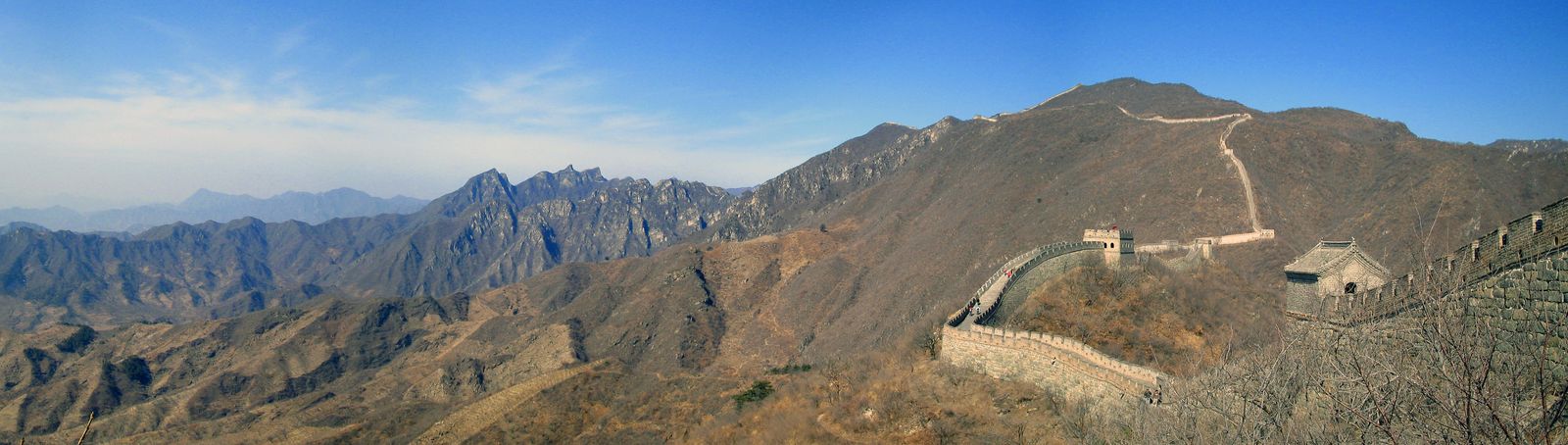 Panorama of the Mutianyu Great Wall winding along a mountain ridge in daylight
